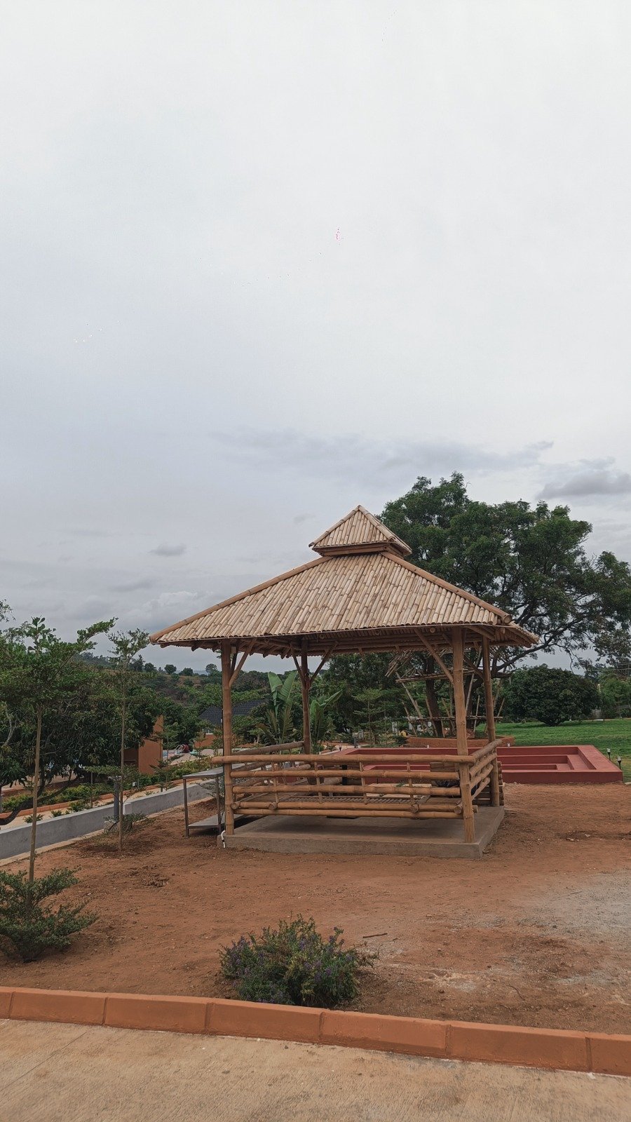 Open-air bamboo pavilion overlooking the resort