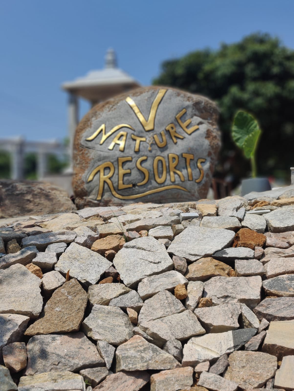 Nature Resorts stone welcome sign