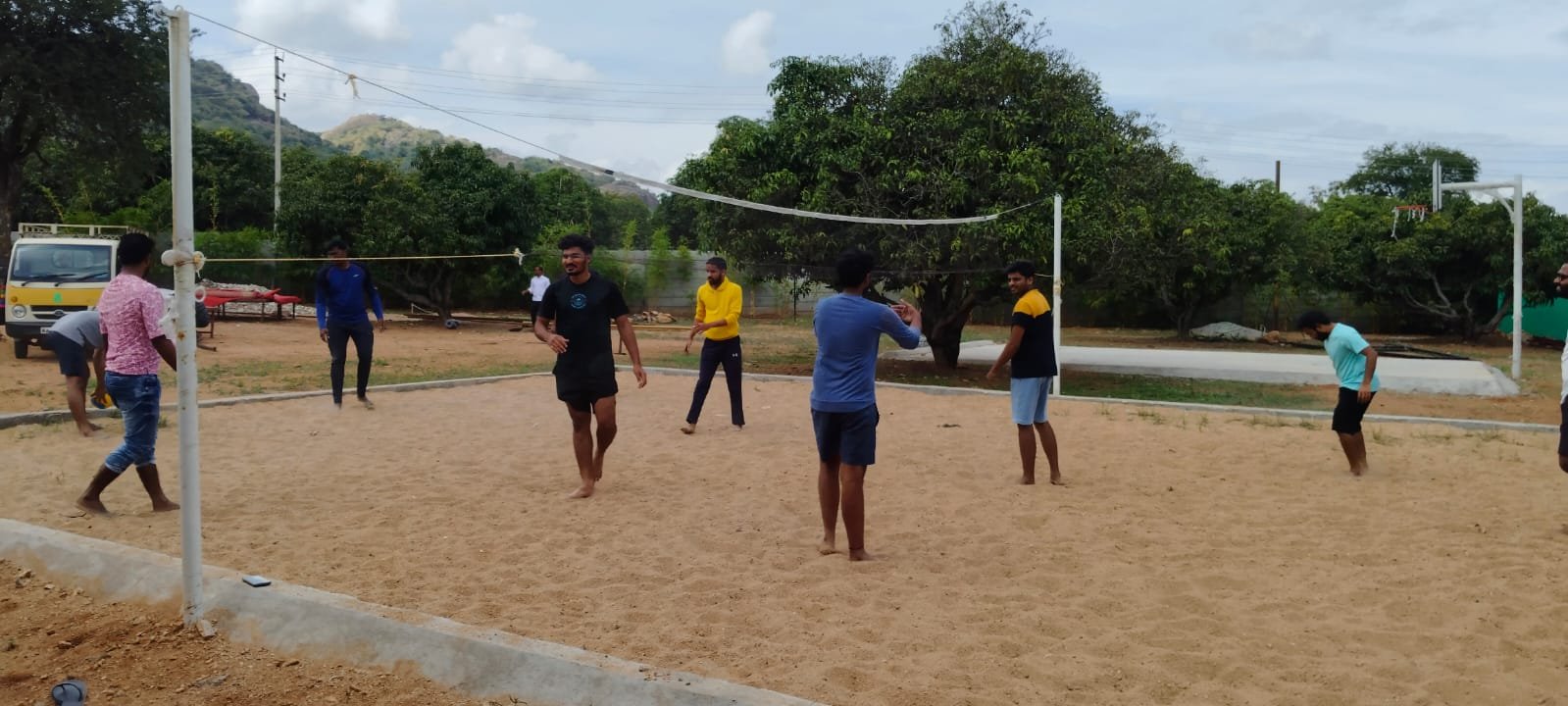 Guests playing volleyball at the resort