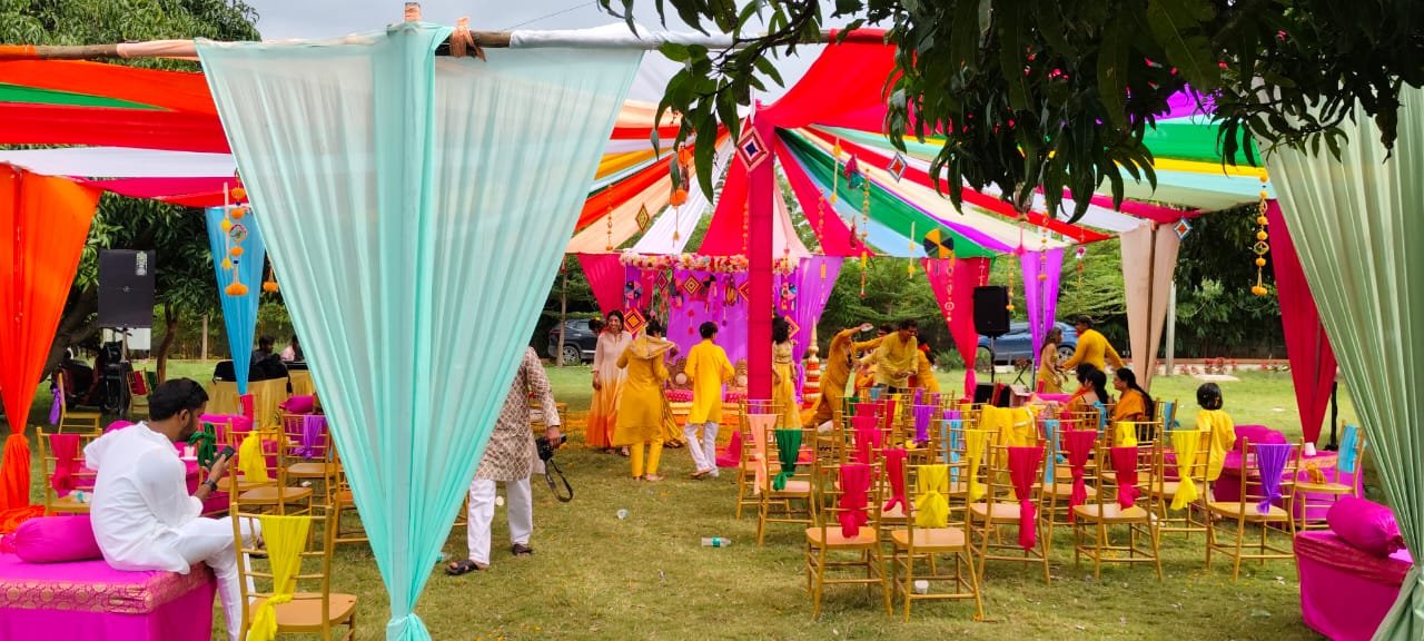 Outdoor event tents and seating across the lawn