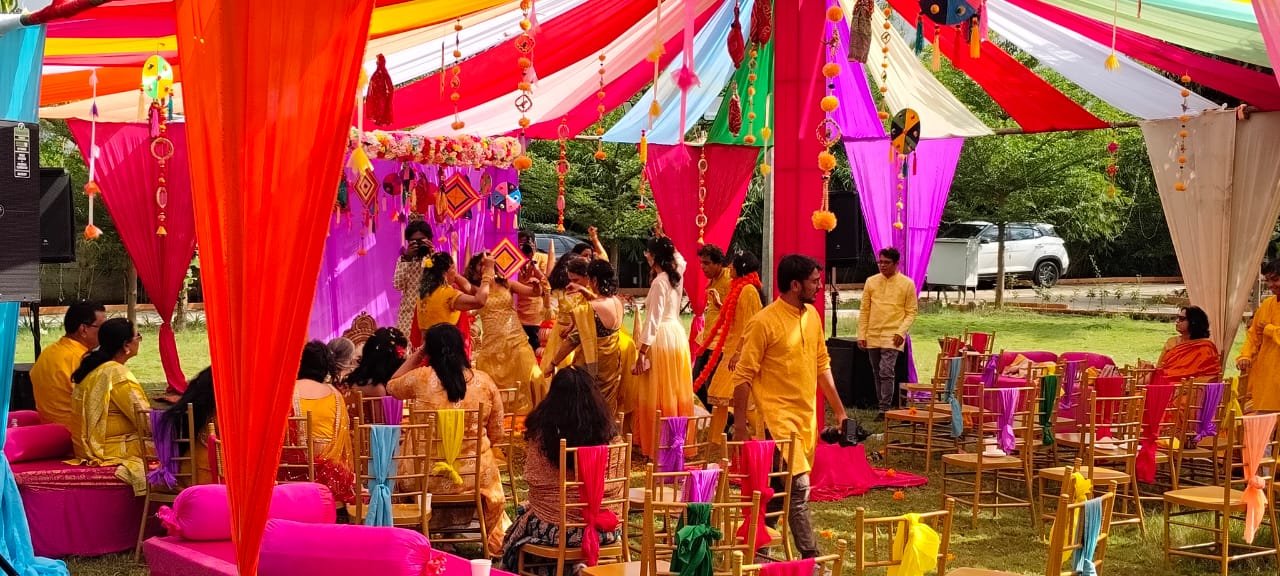 Guests enjoying a vibrant outdoor family celebration