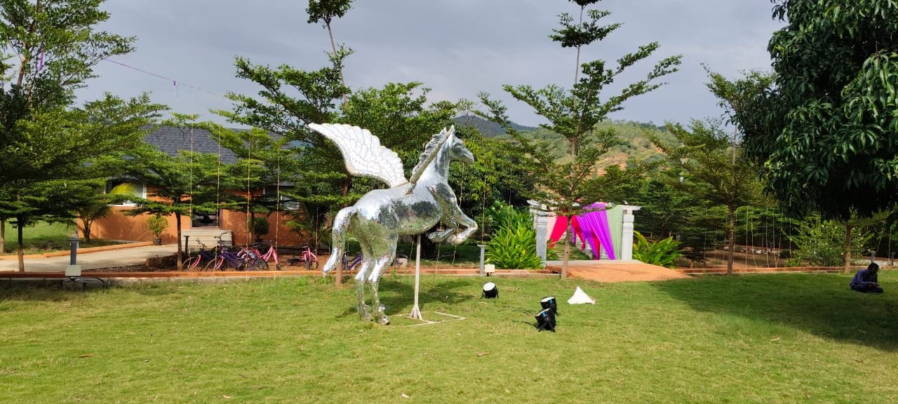 Decorative winged horse display on the lawn